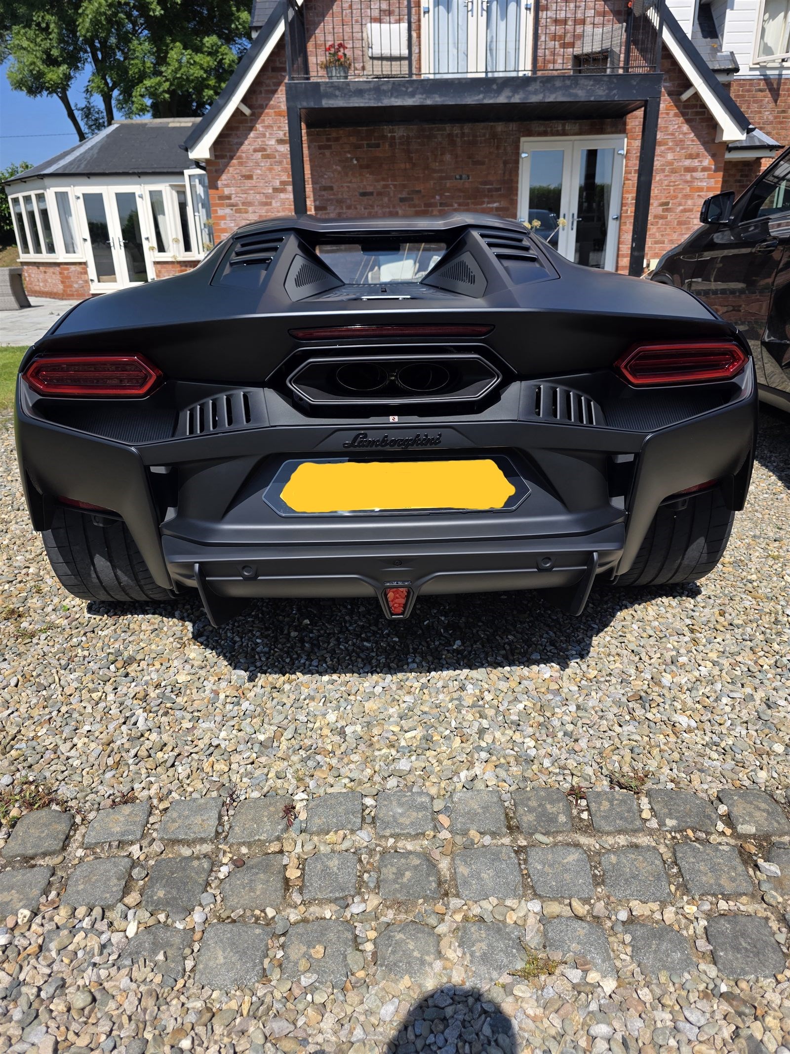 Tesla Model rear detail — Gold Package